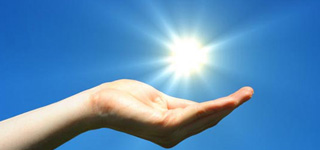 a hand with the sun
