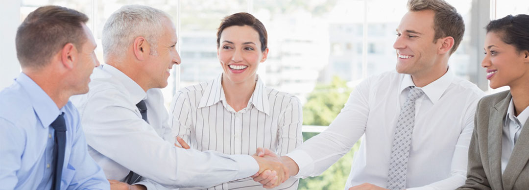 a team working together shaking hands